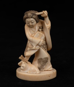 An antique Japanese carved ivory Okimono figure of a Geisha with cat, Meiji period 19th/20th century, two character mark to base, ​​​​​​​7cm high