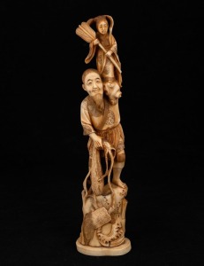 A Japanese carved marine ivory okimono figural group, Meiji period, 20th century, red seal mark to base, ​​​​​​​30cm high