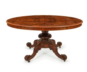 An antique English burr walnut oval centre table, circa 1870, 73cm high, 150cm wide, 109cm deep