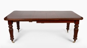 An antique English mahogany two leaf extension dining table, 19th century; together with a set of eight matching reproduction chairs, 20th century, (9 items), the table 72cm high, 193cm wide (extended), 105cm deep