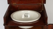 An antique Australian cedar washstand with lift-top and cabinet base, housing ceramic bowl made by "F. Lassetter & Co. Ltd., Agents, Sydney", 19th century, 85cm high, 45cm wide, 44cm deep - 3