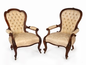 Two antique English walnut salon chairs with jacquard upholstery and carved frames, 19th century, the larger 98cm high, 68cm across the arms