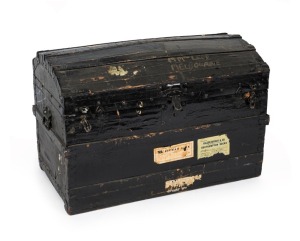An antique domed top trunk with black Japanned painted finish, 19th century, 55cm high, 82cm wide, 50cm deep
