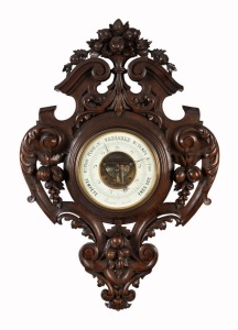 240 · An impressive antique French aneroid wall barometer with exposed movement, housed in carved walnut surround, dial marked "Mon. LOISEAE. BOUCHAR, Sr. 35. QUAI DE L'HORLOGE, PARIS", 19th century, 91 x 62cm overall