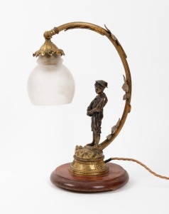 An antique figural desk&nbsp;lamp with peasant boy, gilt finished cast bronze on timber base, ​​​​​​​38cm high