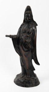 A Chinese cast bronze statue of Guanyin with silver inlay decoration, 20th century, square seal mark to back, 52cm high