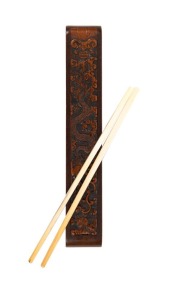 An antique Chinese carved timber chopstick case with a pair of antique ivory chopsticks, 19th century, ​​​​​​​the case 23.5cm long