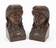 A pair of carved timber figural&nbsp;bookends, 19th century, ​​​​​​​19cm high