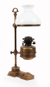 An antique library lamp with heavy bronze base, oil burner and adjustable shade, 19th century, 65cm high