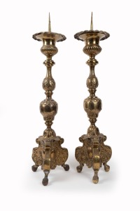 A pair of antique French brass candlesticks, 19th century, 92cm high