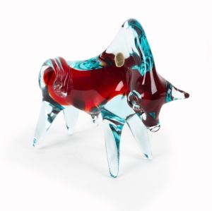 A Murano glass bull statue, circa 1960, bearing original foil label "Made in Murano, Italy", ​​​​​​​15cm high, 16cm long