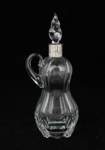 An antique crystal spirit jug with sterling silver mark, 24cm high