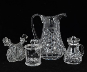 An English cut crystal ale jug, milk jug, Stuart crystal honey pot and Bohemian crystal oil bottle, 20th century, (4 items), ​​​​​​​the largest 21cm high