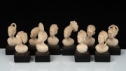 A set of ten carved African ivory place name holders, 19th/20th century, ​​​​​​​6cm high