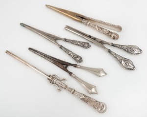 GLOVE STRETCHERS, group of five antique examples with silver handles, 19th century, the largest 25.5cm long