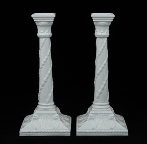 ROYAL WORCESTER pair of English white porcelain candlesticks, 20th century, green factory mark to base, 27cm high