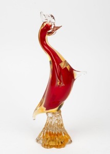 A Murano glass bird statue in amber and red, bearing original foil label "Vetro&nbsp;Artistico&nbsp;Veneziano, Venetian Glass, Made in Murano, Italy", 35cm high