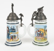 A pair of German porcelain beer steins with lithophane pictorial bases and figural pewter tops, 20th century, ​​​​​​​28cm and 26cm high - 2