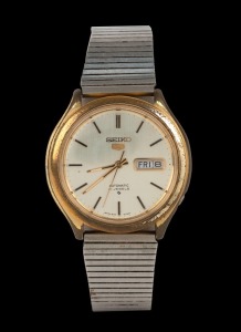 SEIKO "5" automatic wristwatch in gold plated and stainless steel case with silvered dial, date window, baton numerals and stainless steel band, circa 1970. 3.9cm wide including crown