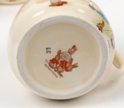 ROYAL DOULTON "BUNNYKINS" porcelain jugs, mugs, money box and egg cup, (8 items), some signed "BARBARA VERNON", the largest jug 12cm high - 2
