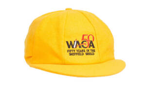 BRENDAN JULAIN'S WESTERN AUSTRALIA CRICKET CAP, yellow, with embroidered "WACA/Fifty Years in the Sheffield Shield" embroidered on front, signed inside by Brendan Julian. G/VG condition. [Brendan Julian played 7 Tests & 25 ODIs 1993-99].