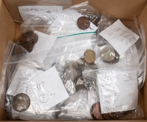 A duplicated range in a small box; predominantly Australian pre-decimal coins to 2/-; a small range of English and foreign. [Approx. 1.6kg].