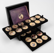 TRISTAN DA CUNHA: The Crowning Moments of Queen Elizabeth II Golden Crown Coin Collection, 2014, in presentation box of issue with 16 certificates. (18 38mm coins layered in 24ct gold).