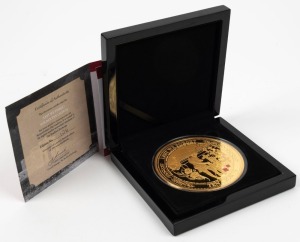 TRISTAN DA CUNHA:2016 Remembrance Day Ten Crowns "Lest we forget" 89mm proof coin layered in 24ct gold with red and black poppies; in case of issue with COA, #126 from an edition of just 499.