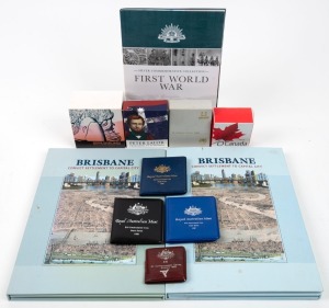 Various Australian and foreign Proofs and Uncirculated coins in the boxes and folders of issue, together with a quantity of silver commemorative medallions.