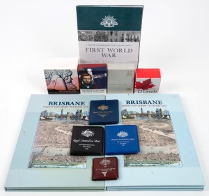 Various Australian and foreign Proofs and Uncirculated coins in the boxes and folders of issue, together with a quantity of silver commemorative medallions. 