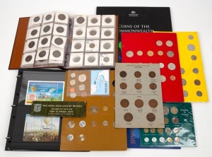 A range of World coins in albums, on cards and some stamps in an album.