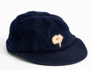 YORKSHIRE CRICKET CAP, blue wool with embroidered white rose on front, made by W.V.Brown, Hosier, Eton. Fair/Good match-used condition.