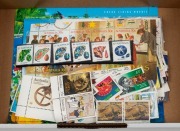 A decimal postage oddments lot in a small box. FV: guesstimate $75.