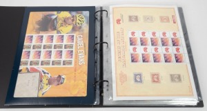 A large album containing a range of modern Post Office products including 2011 60c Premier's Flood Relief Sheetlet, 2012 Rising Sun Sheetlet pack plus gutter blocks, Genesis of the Kangaroo & Map stamp 2013, Black Caviar folder, Nostalgic Advertisements Shetlet pack, etc.
