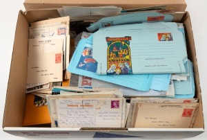 An untidy accumulation in a carton - stamps, covers, postcards, stationery, etc.