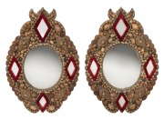 A rare pair of Australian folk art shell framed mirrors, 19th century, 55 x 38cm each 