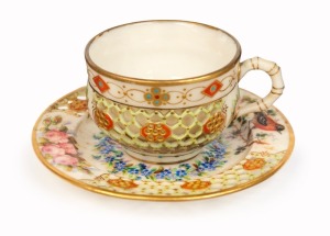 ROYAL WORCESTER antique English reticulated porcelain teacup and saucer with hand-painted floral and gilded highlights by GEORGE OWEN, circa 1885, impressed factory mark to base, the saucer 10.5cm diameter