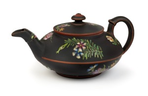WEDGWOOD "Capri Ware" antique black basalt pottery teapot with floral enamel decoration, 19th century, impressed "WEDGWOOD", 7cm high, 16cm wide
