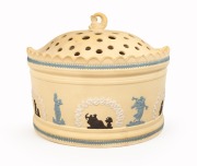 EASTWOOD "Caneware" antique English pottery demi-lune potpourri&nbsp;with tri-colour&nbsp;Jasper Ware decoration and dolphin finial, early 19th century, impressed "EASTWOOD" and bearing Sotheby's York Avenue Gallery label, 19.5cm high, 24cm wide