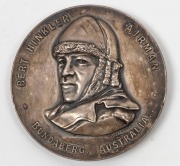 BERT HINKLER AIRMAN BUNDABERG, Australia, London to Darwin flight in 16 days, Feb 1928, in oxidized silver plate (50mm) (C.1928/1), by CDR (C.Douglas Richardson for Stokes). In original Stokes box. - 2
