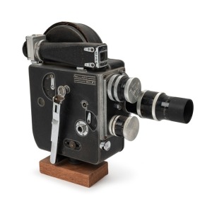 BOLEX-PAILLARD: H16 16mm movie camera, c. 1935, with Switar 25mm f1.4/Yvar 16mm f2.8/Yvar 75mm f2.8 lenses, two lens caps, and viewfinder attachment.