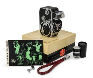 BOLEX-PAILLARD: D8LA double-8 movie camera, c. 1958, apparently in mint condition in maker's box with lens with both caps, crank attachment, wrist strap attachment, and instruction booklet.