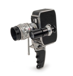 BOLEX-PAILLARD: Bolex C8 double-8 movie camera [#565158], c. 1960s, with Som Berthiot Pan-Cinor 12.5-36mm f2.8 lens with attached zoom finder, lens filter, lens hood, and pistol-grip attachment.