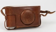 LEITZ: Black-body/chrome-fittings Leica II Model D rangefinder camera [#86985], c. 1932, with Elmar 50mm f3.5 lens, front lens cap, and leather case. - 5