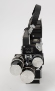 BOLEX-PAILLARD: H16 Rex-5 16mm movie camera [#261101], c. 1974, with Switar 75mm f1.9/Yvar 75mm f2.8/Switar&nbsp;H16RX 25mm f1.4 lenses, three metal lens caps, viewfinder, and magazine dock attachment. - 2