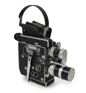 BOLEX-PAILLARD: H16 Rex-4 Reflex 16mm movie camera [#247980], c. 1969, with Macro-Switar H16RX 50mm f1.4/Switar H16RX 25mm f1.4 /Switar H16RX 10mm f1.6 lenses, three metal lens caps, viewfinder, and magazine dock attachment.