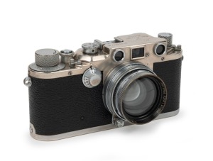 LEITZ: 1942 chrome-body Leica IIIc K rangefinder camera [#388947], with Summitar 50mm f2 lens [#523772].