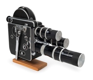 BOLEX-PAILLARD: H16 Reflex 16mm movie camera [#127544], c. 1956, with Yvar 75mm f2.8/Yvar 100mm f3.3/Yvar 150mm f4 lenses, three metal lens caps, two lens hoods, and two viewfinders.