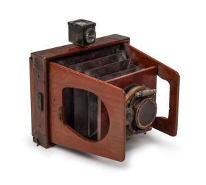 SHEW & CO.: Unusual 'Xit' 3¼ x 4¼" plate gate-struts camera, c. 1900, with Bausch & Lomb lens, Shew Pneumatic shutter, and lens cap.