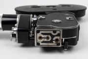 BOLEX-PAILLARD: H-16 Rex-5 16mm movie camera [#241688], c. 1968, with Kern OE H16 RX Vario-Switar 18-86mm f2.5 lens [#1099559], lens hood, and film magazine. - 4